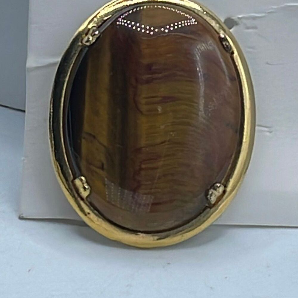 Vintage large oval cut Tigers Eye gemstone brooch.
